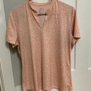 Women’s NIKE golf polo size L